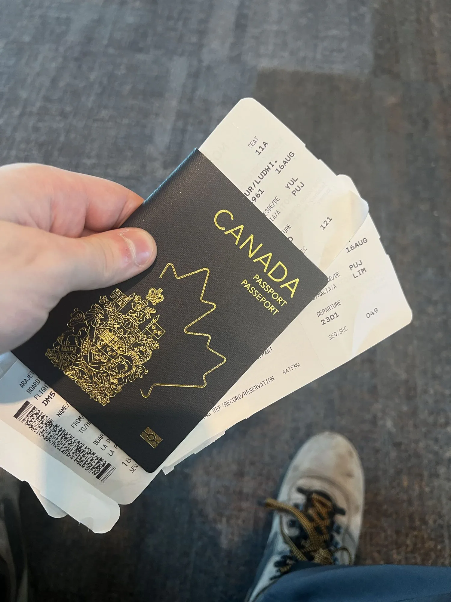 Two boarding passes and a passport, in Montreal